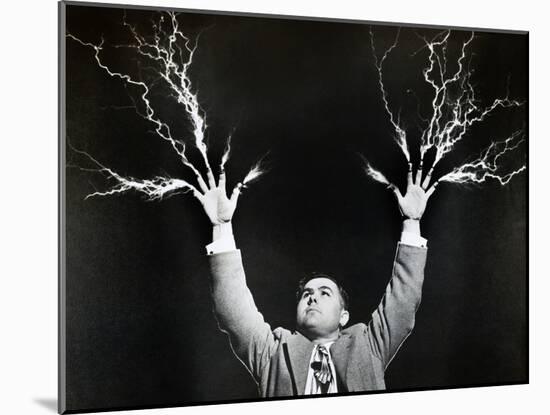 Man with Lightning Shooting from Fingers (B&W)-Hulton Archive-Mounted Photographic Print