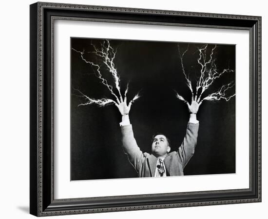 Man with Lightning Shooting from Fingers (B&W)-Hulton Archive-Framed Photographic Print