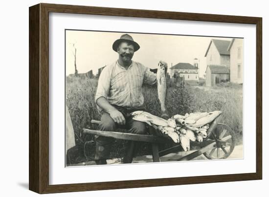 Man with Load of Fish-null-Framed Art Print