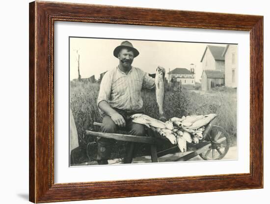 Man with Load of Fish-null-Framed Art Print