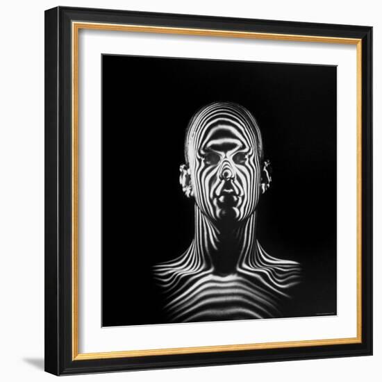 Man with Patterns of Light Covering Face and Shoulders in Air Force Study in Making Flight Helmets-Ralph Morse-Framed Photographic Print