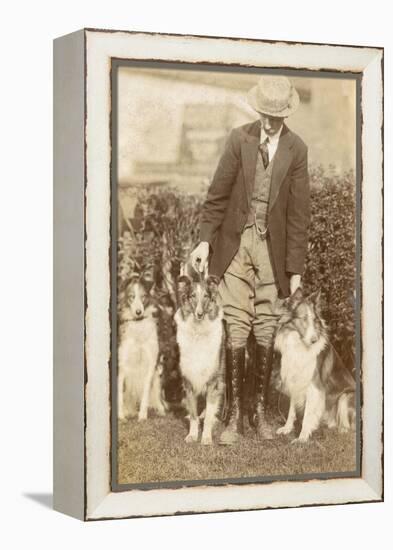 Man with Three Dogs in a Garden-null-Framed Premier Image Canvas