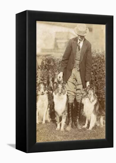 Man with Three Dogs in a Garden-null-Framed Premier Image Canvas