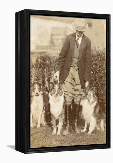 Man with Three Dogs in a Garden-null-Framed Premier Image Canvas