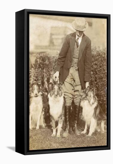 Man with Three Dogs in a Garden-null-Framed Premier Image Canvas