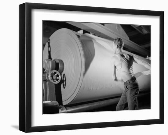 Man Working at Roller in Paper Factory-Margaret Bourke-White-Framed Photographic Print