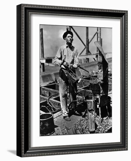 Man Working in the Shipbuilding Industry-George Strock-Framed Photographic Print