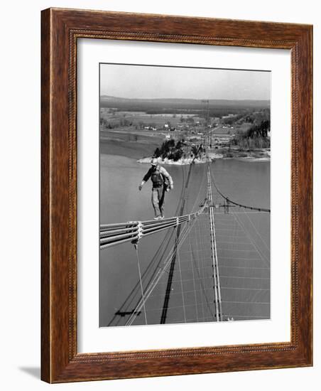 Man Working on the Texas Illinois Natural Gas Company's Pipeline Suspension Bridge-John Dominis-Framed Photographic Print