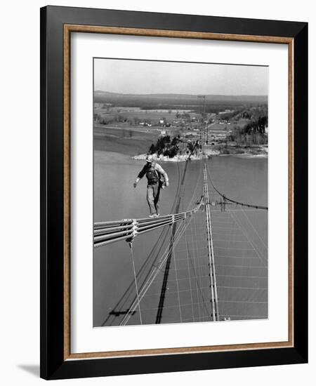 Man Working on the Texas Illinois Natural Gas Company's Pipeline Suspension Bridge-John Dominis-Framed Photographic Print