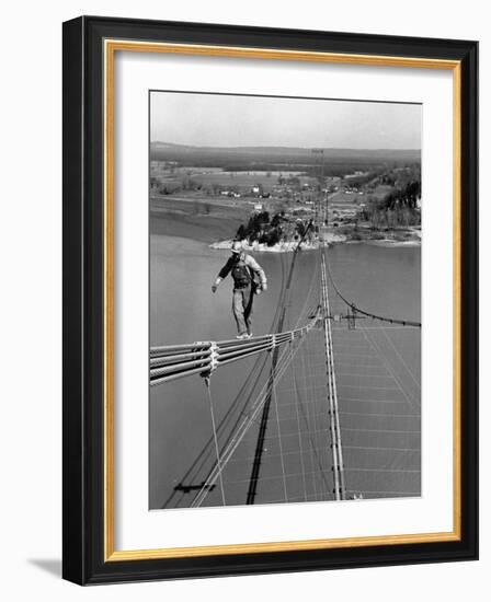 Man Working on the Texas Illinois Natural Gas Company's Pipeline Suspension Bridge-John Dominis-Framed Photographic Print