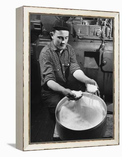 Man Working with Molded Plastics at Barton Molding Co-Hansel Mieth-Framed Premier Image Canvas