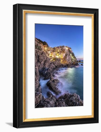 Manarola Village Illuminated by the Blue Light of Dusk with its Typical Pastel Colored Houses-ClickAlps-Framed Photographic Print