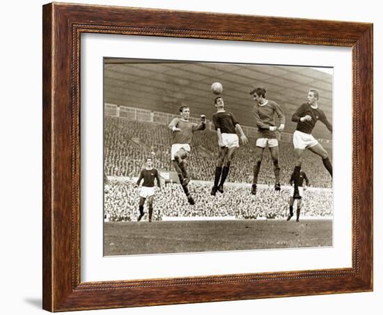 Manchester United vs. Arsenal, Football Match at Old Trafford, October 1967-null-Framed Photographic Print