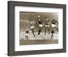 Manchester United vs. Arsenal, Football Match at Old Trafford, October 1967-null-Framed Photographic Print