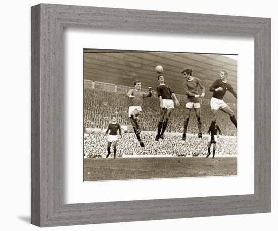 Manchester United vs. Arsenal, Football Match at Old Trafford, October 1967-null-Framed Photographic Print