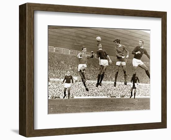 Manchester United vs. Arsenal, Football Match at Old Trafford, October 1967-null-Framed Photographic Print