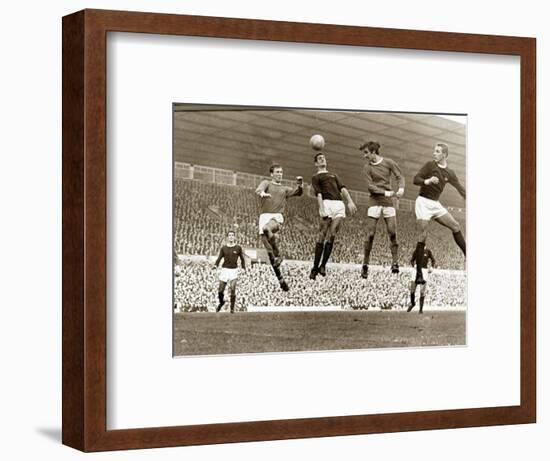 Manchester United vs. Arsenal, Football Match at Old Trafford, October 1967-null-Framed Photographic Print