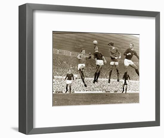 Manchester United vs. Arsenal, Football Match at Old Trafford, October 1967-null-Framed Photographic Print