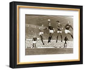 Manchester United vs. Arsenal, Football Match at Old Trafford, October 1967-null-Framed Photographic Print