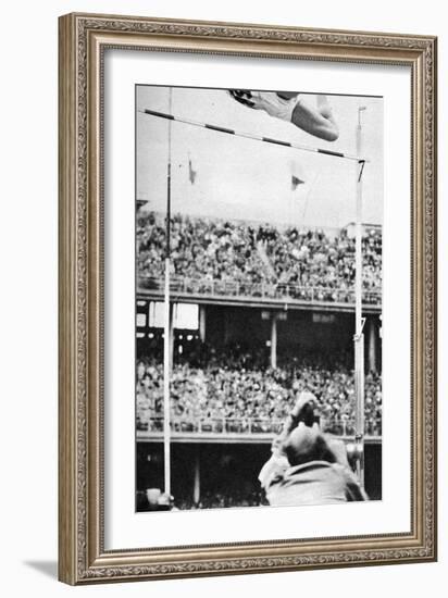 Manfred Preussger Performing in the Men's Pole Vault at the 1956 Melbourne Olympics-null-Framed Photographic Print