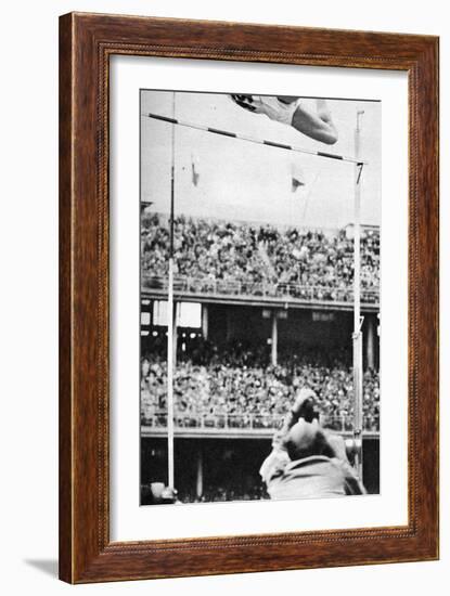 Manfred Preussger Performing in the Men's Pole Vault at the 1956 Melbourne Olympics-null-Framed Photographic Print