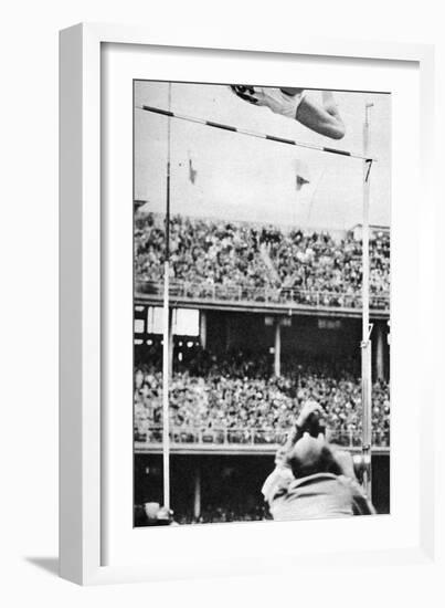 Manfred Preussger Performing in the Men's Pole Vault at the 1956 Melbourne Olympics-null-Framed Photographic Print