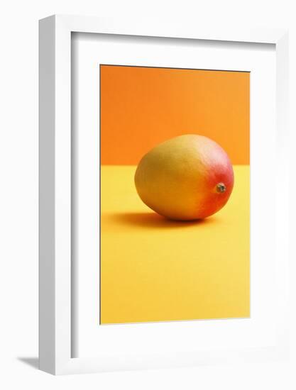 Mango on Coloured Background-Kr?ger and Gross-Framed Photographic Print