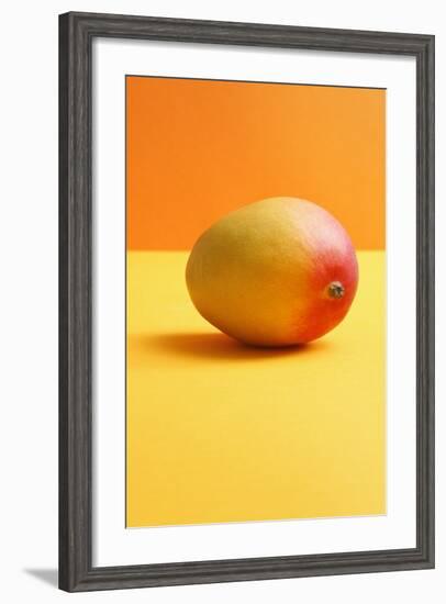 Mango on Coloured Background-Kr?ger and Gross-Framed Photographic Print