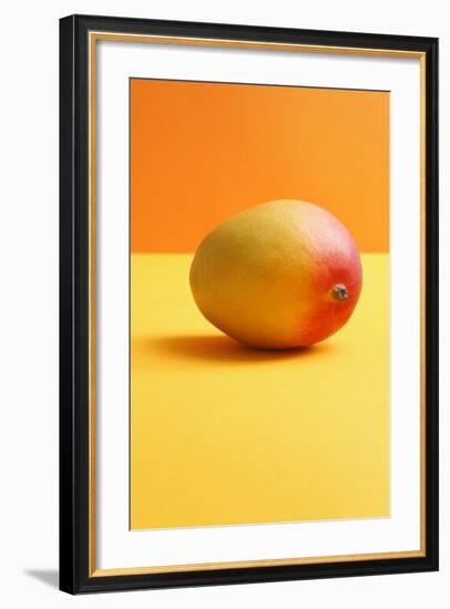 Mango on Coloured Background-Kr?ger and Gross-Framed Photographic Print