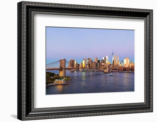 Manhattan, New York, USA. Sunrise view of Manhattan and the Brooklyn Bridge.-Emily Wilson-Framed Photographic Print