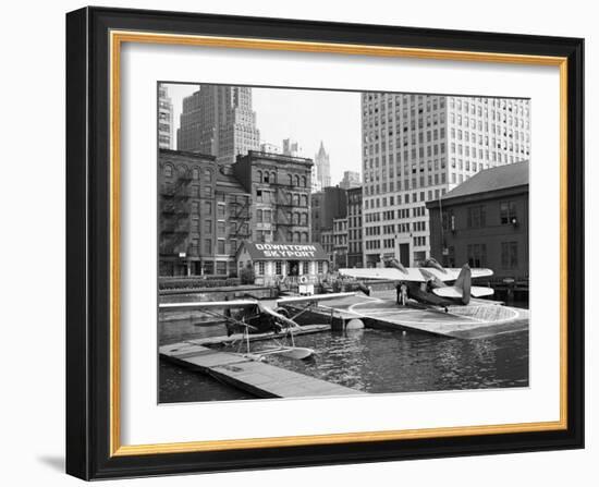 Manhattan's East River Downtown Skyport - Grumman and Fairchild Amphibious Planes-Margaret Bourke-White-Framed Photographic Print