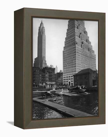 Manhattan's East River Downtown Skyport with Grumman and Fairchild Amphibious Planes-Margaret Bourke-White-Framed Premier Image Canvas