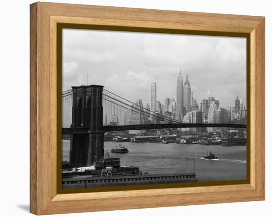 Manhattan Skyline And Brooklyn Bridge-Bettmann-Framed Premier Image Canvas