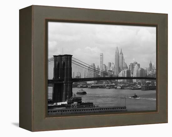 Manhattan Skyline And Brooklyn Bridge-Bettmann-Framed Premier Image Canvas