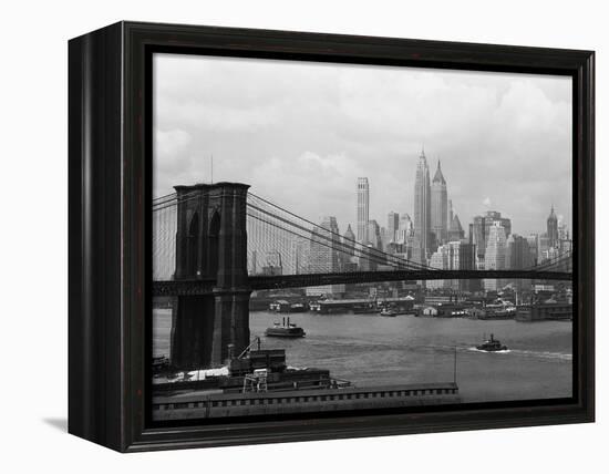 Manhattan Skyline And Brooklyn Bridge-Bettmann-Framed Premier Image Canvas