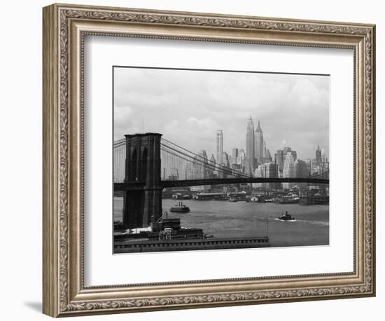 Manhattan Skyline And Brooklyn Bridge-Bettmann-Framed Photographic Print