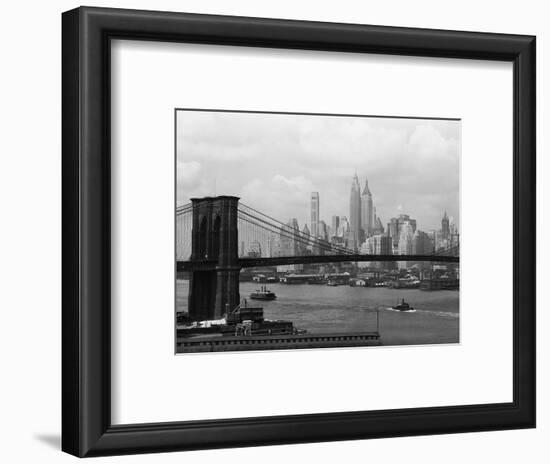 Manhattan Skyline And Brooklyn Bridge-Bettmann-Framed Photographic Print