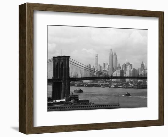 Manhattan Skyline And Brooklyn Bridge-Bettmann-Framed Photographic Print