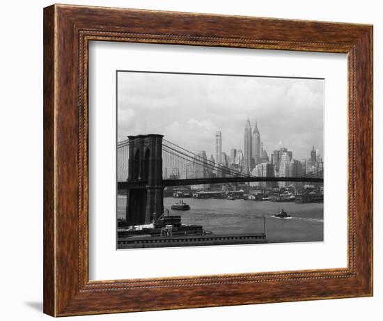 Manhattan Skyline And Brooklyn Bridge-Bettmann-Framed Photographic Print