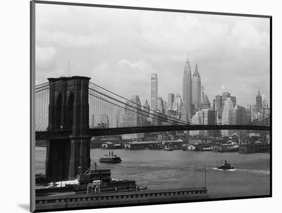 Manhattan Skyline And Brooklyn Bridge-Bettmann-Mounted Photographic Print