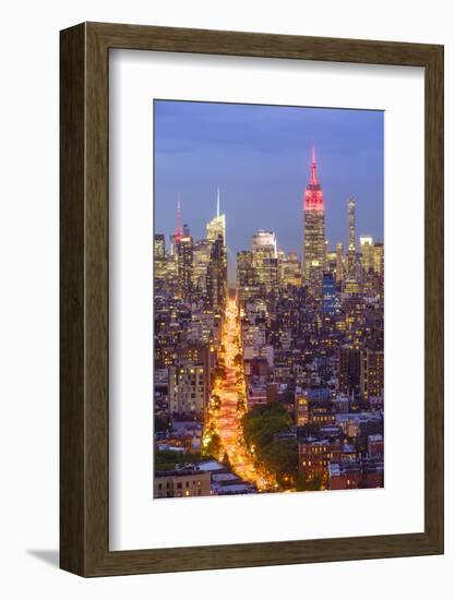 Manhattan skyline at dusk with the Empire State Building, New York City, United States of America, -Fraser Hall-Framed Photographic Print