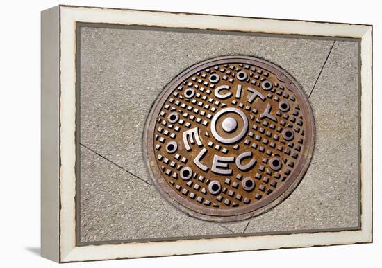 Manhole Cover In Chicago-Mark Williamson-Framed Premier Image Canvas
