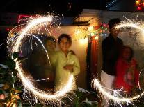 Children Light Firecrackers for the Hindu Festival of Diwali in New Delhi, India, Oct. 20, 2006-Manish Swarup-Photographic Print