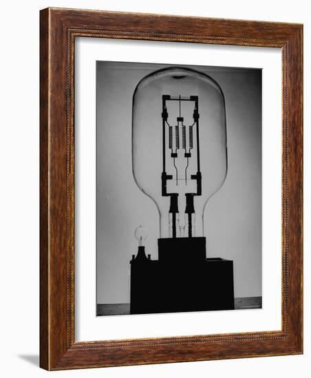 Manufacturing G. E. Giant Electric Bulb-Al Fenn-Framed Photographic Print