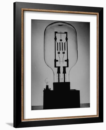 Manufacturing G. E. Giant Electric Bulb-Al Fenn-Framed Photographic Print