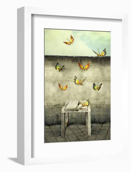 Many Colorful Butterflies Flying into the Sky with a Peeling Wall and a Bench, Illustrative Photo A-Valentina Photos-Framed Photographic Print