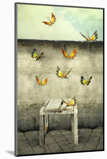 Many Colorful Butterflies Flying into the Sky with a Peeling Wall and a Bench, Illustrative Photo A-Valentina Photos-Mounted Photographic Print