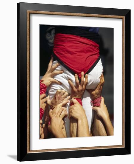 Many Hands Help Support the Base of a Human Castle During the Festival of La Merce in Barcelona-Andrew Watson-Framed Photographic Print