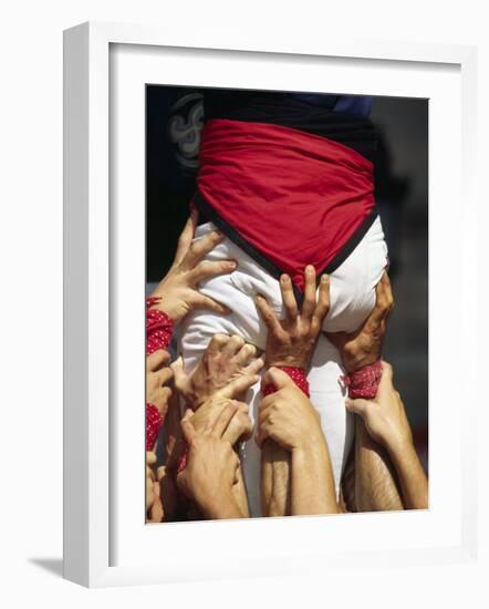 Many Hands Help Support the Base of a Human Castle During the Festival of La Merce in Barcelona-Andrew Watson-Framed Photographic Print