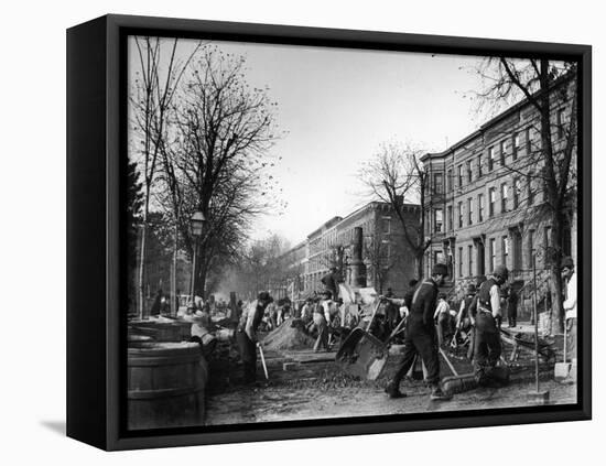 Many Men Hard at Work Paving a Street-George B^ Brainerd-Framed Premier Image Canvas